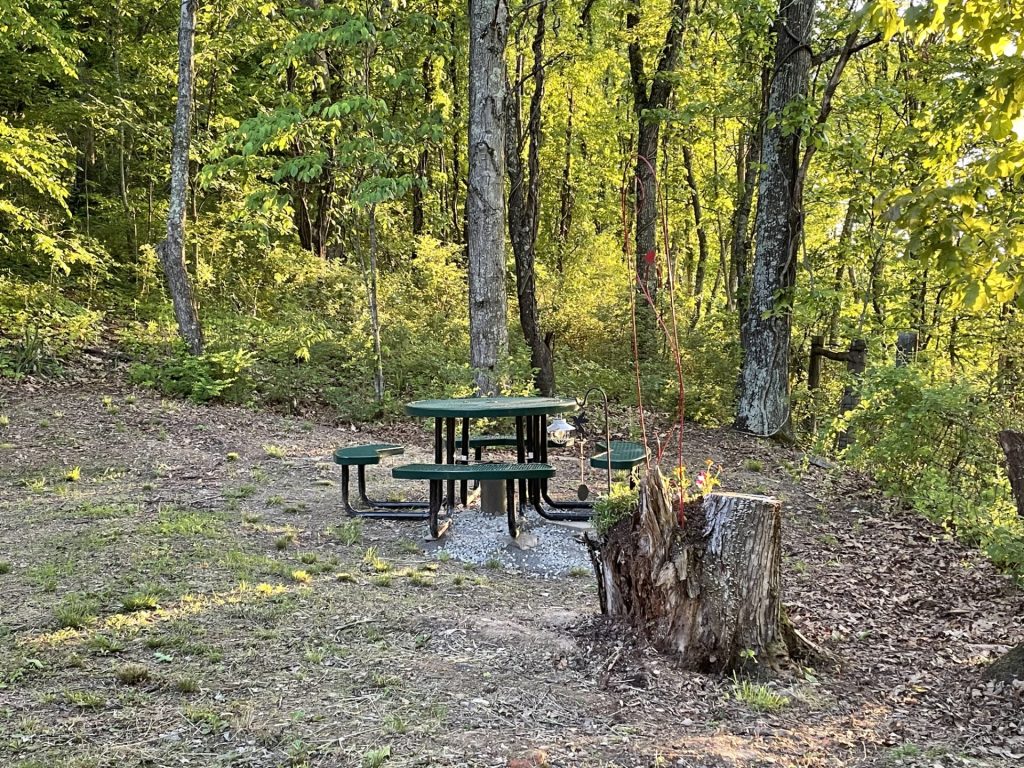 hilltop sunrise urban camping wall-side tent new river gorge bridge fayette county fayetteville oak hill hilltop wv West Virginia vevor wall-side tent picnic table in the setting sun