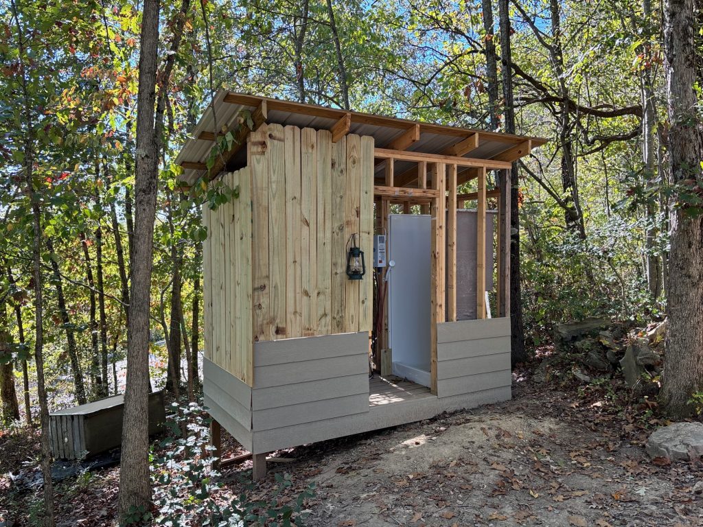 hilltop sunrise urban camping bunky-style cabin with hot outdoor private shower new river gorge bridge Fayette county Fayetteville oak hill hilltop WV West Virginia tent