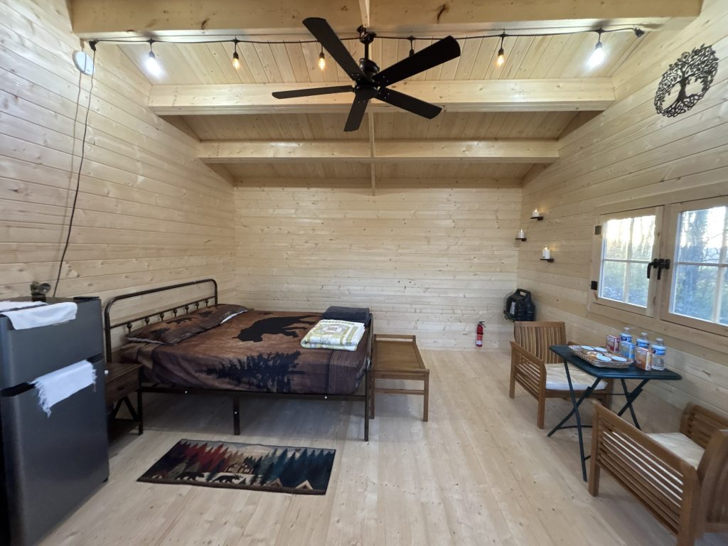 hilltop sunrise urban bunkie-style cabin hot shower queen bed new river gorge bridge Fayette county Fayetteville oak hill hilltop WV West Virginia full resolution queen bed