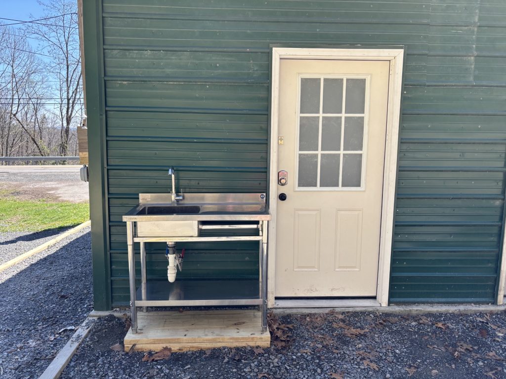 hilltop sunrise tent platform with hot shower flush toilet pet walk camp sink 110 volt AC outlet new river gorge national park and preserve Summit Bechtel Reserve Fayette county Fayetteville oak hill hilltop WV West Virginia