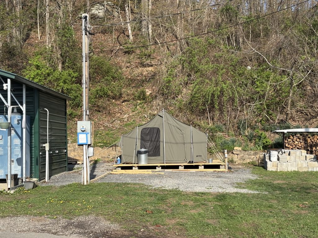 hilltop sunrise tent platform with tent hot shower flush toilet pet walk 110 volt AC outlet new river gorge national park and preserve Summit Bechtel Reserve Fayette county Fayetteville oak hill hilltop WV West Virginia