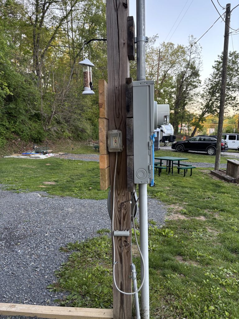 hilltop sunrise camper van carvan car life parking with hot shower clean portable toilet pet walk 110 volt AC outlet new river gorge national park and preserve Summit Bechtel Reserve Fayette county Fayetteville oak hill hilltop WV West Virginia